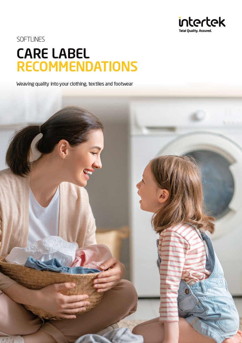 young woman and child girl little helper are having fun and smiling while doing laundry at home